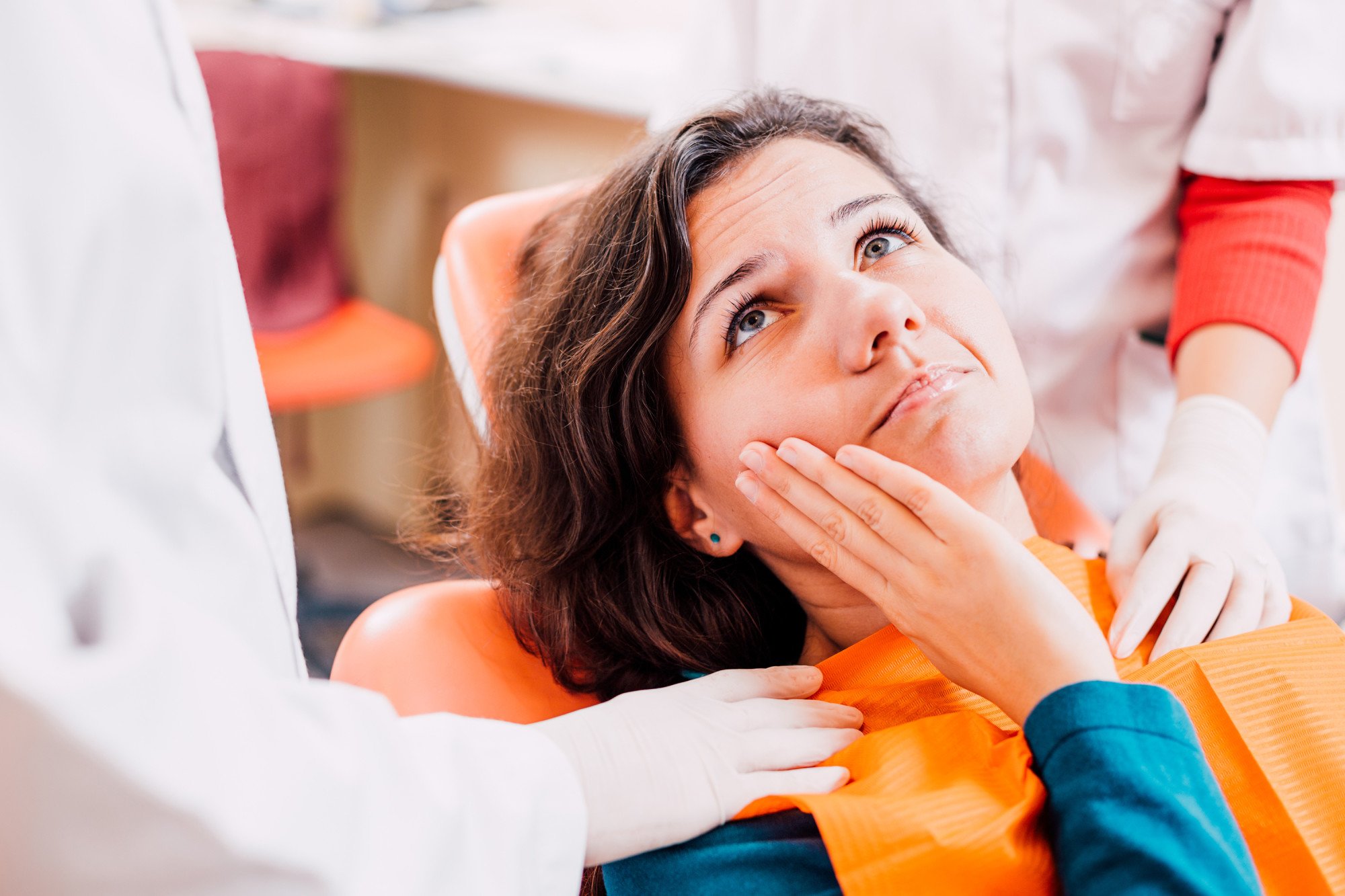 Woman With Toothache At Dentis